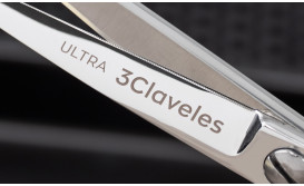 Micro serrated cutting-edge scissors